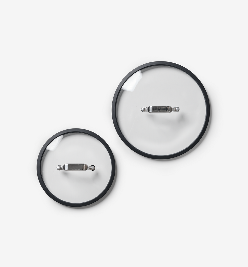 Glass pot lids with stainless steel handles and silicone rims, two sizes